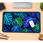 Neon Monstera Leaves desk mat — product mockup 1