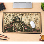 Skeleton Among Rose Vines desk mat — product mockup 1