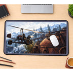 Scrap Aircraft over Snowy Mountains desk mat — product mockup 1