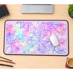 Pastel Rainbow Spiderwebs desk mat — product mockup 1