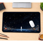 Lone Astronaut in a Starfield desk mat — product mockup 1