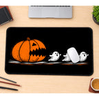 Pumpkin Chasing Little Ghosts desk mat — product mockup 1