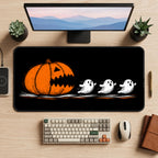 Pumpkin Chasing Little Ghosts desk mat — product mockup 2