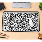 Black Botanical Silhouettes desk mat — product mockup 1