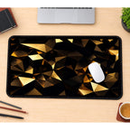 Black and Gold Faceted Triangles desk mat — product mockup 1