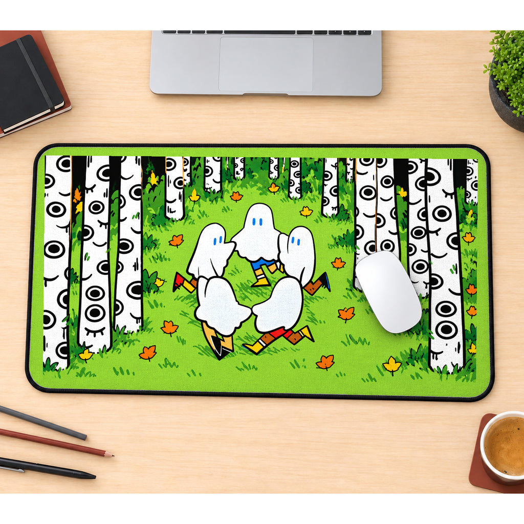 Dancing Ghosts in a Birch Grove desk mat — product mockup 1