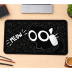 Meow Cat Eyes on Black desk mat — product mockup 1