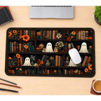Tiny Ghosts on Autumn Bookshelves desk mat — product mockup 1