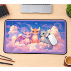 Three Baby Dragons on Clouds desk mat — product mockup 1