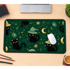 Tiny Witch Cats on Emerald desk mat — product mockup 1