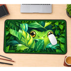 Wide Eyed Frog in Jungle Leaves desk mat — product mockup 1