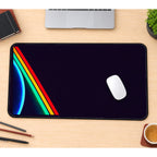 Rainbow Diagonal Arc on Black desk mat — product mockup 1