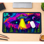 UFO Above Neon Mountains desk mat — product mockup 1