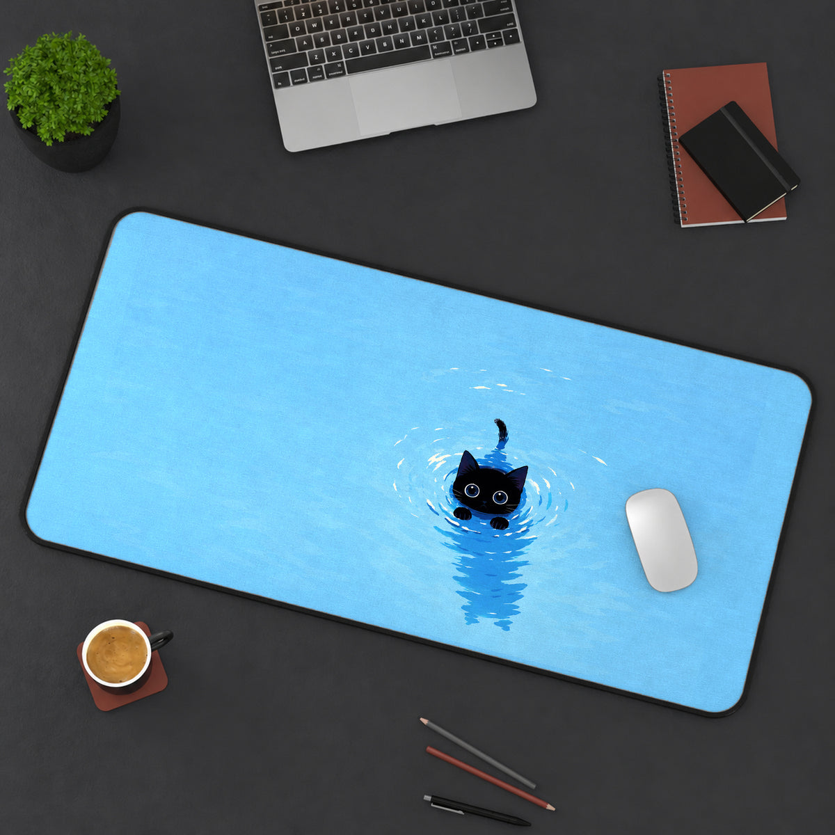 Swimming Black Kitten desk mat — product mockup 3