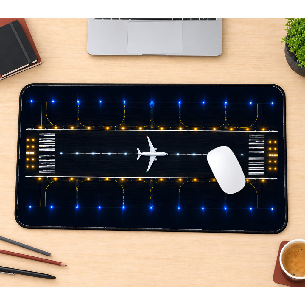 Airplane on a Night Runway desk mat — product mockup 1