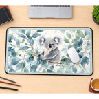 Koala among Eucalyptus Leaves desk mat — product mockup 1