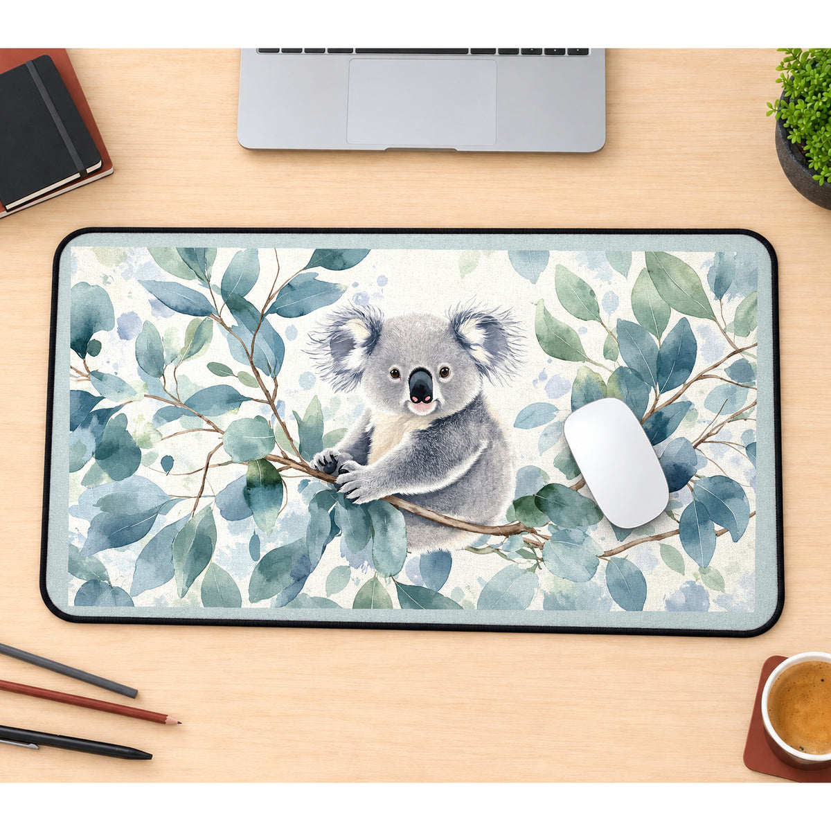 Koala among Eucalyptus Leaves desk mat — product mockup 1