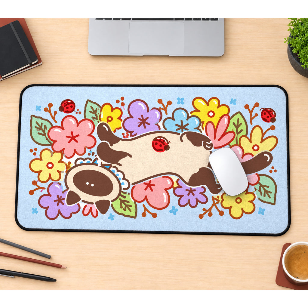 Siamese Cat among Spring Doodles desk mat — product mockup 1