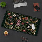 Moths among Dark Garden Flowers desk mat — product mockup 3