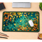 Golden Leaves on Teal Water desk mat — product mockup 1