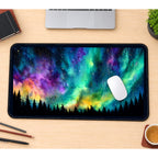 Rainbow Aurora above Pine Trees desk mat — product mockup 1