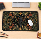 Perched Raven in Autumn Foliage desk mat — product mockup 1
