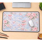 Pink Roses and Bows on Pale Blue desk mat — product mockup 1