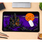 Pixel Haunted House and Orange Moon desk mat — product mockup 1