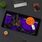 Pixel Haunted House and Orange Moon desk mat — product mockup 3