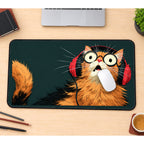 Surprised Cat in Red Headphones desk mat — product mockup 1