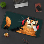Surprised Cat in Red Headphones desk mat — product mockup 3