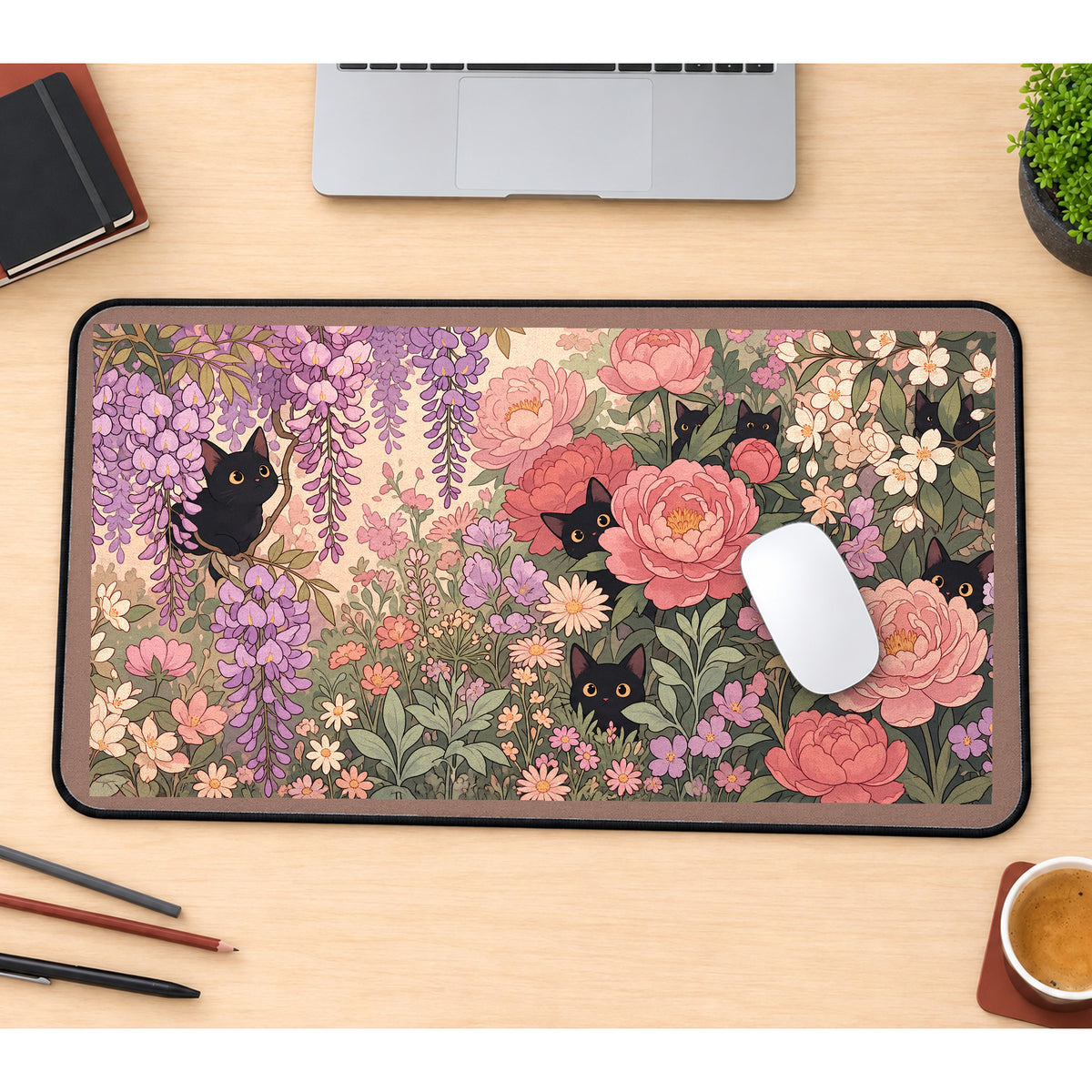 Black Cats among Pink Garden Blooms desk mat — product mockup 1
