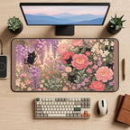 Black Cats among Pink Garden Blooms desk mat — product mockup 2