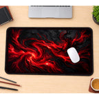 Crimson Swirls through a Black Void desk mat — product mockup 1