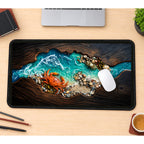 Orange Crab beside Turquoise Surf desk mat — product mockup 1