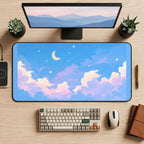 Pastel Clouds beneath a Crescent desk mat — product mockup 2