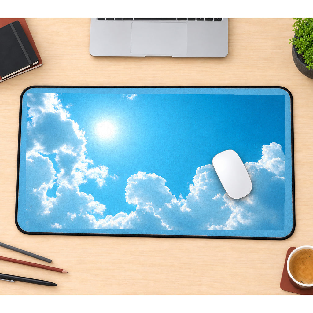 Sunshine between Fluffy White Clouds desk mat — product mockup 1