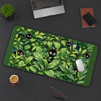 Black Kittens among Green Houseplants desk mat — product mockup 3